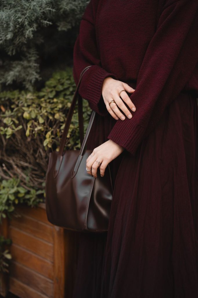 elegant maroon fashion outfit with handbag